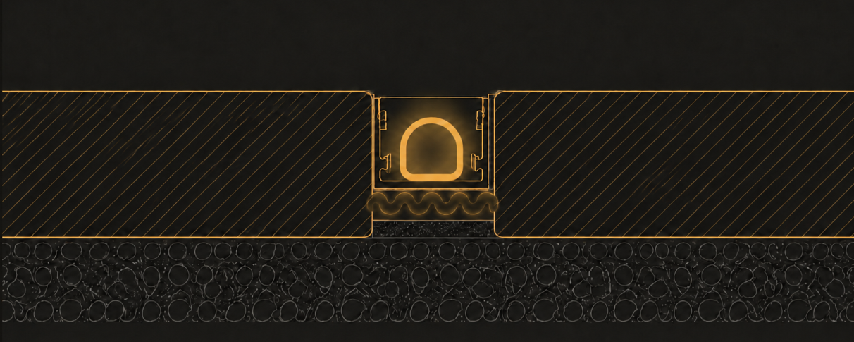 Cross-section of a Zylo channel and neon flex installed between two pavers over a gravel base