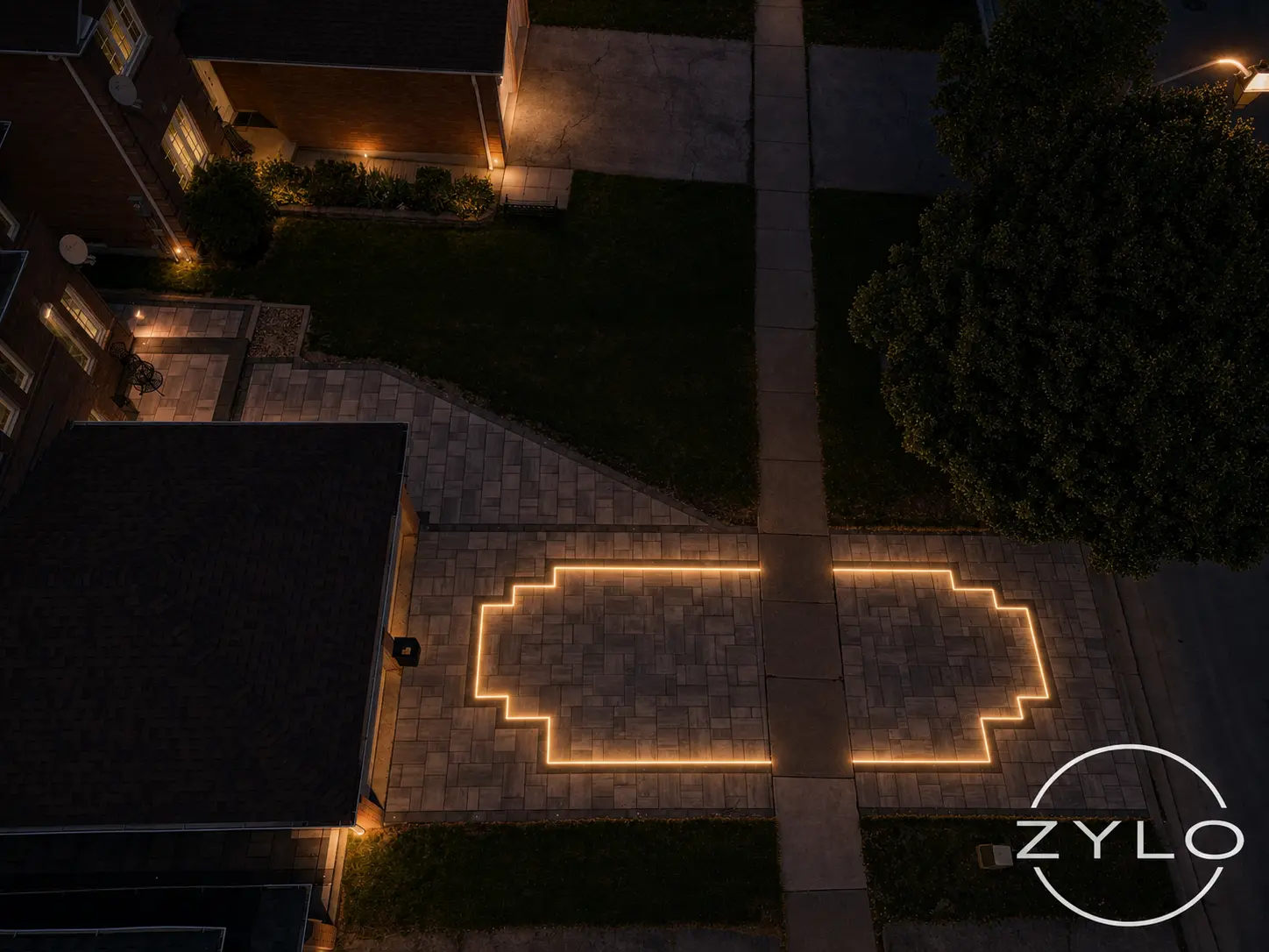Front entry hardscape outlined with Zylo LED lighting